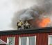 firefighters on a roof